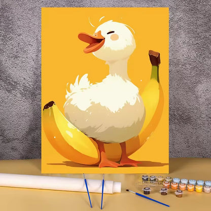 Paint by numbers kit of an adorable white duck surrounded by yellow bananas on a bright orange background, 30x40cm