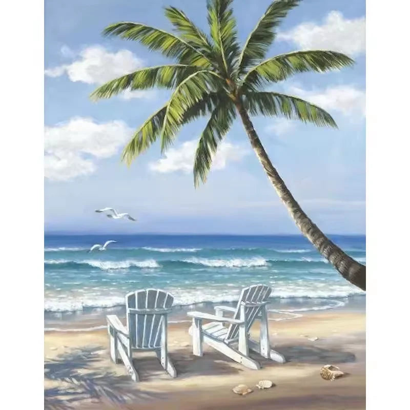 Paint by numbers kit of a tropical beach with a leaning palm tree, two white chairs and turquoise ocean water, 30x40cm