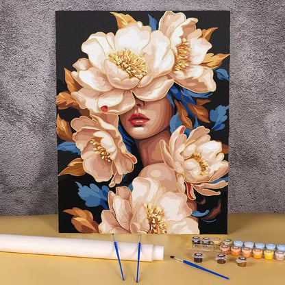 Paint by numbers kit of a woman surrounded by large cream and gold peonies against a dramatic dark background, 30x40cm